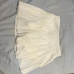 White skirt with shorts underneath in the size small from SHEIN